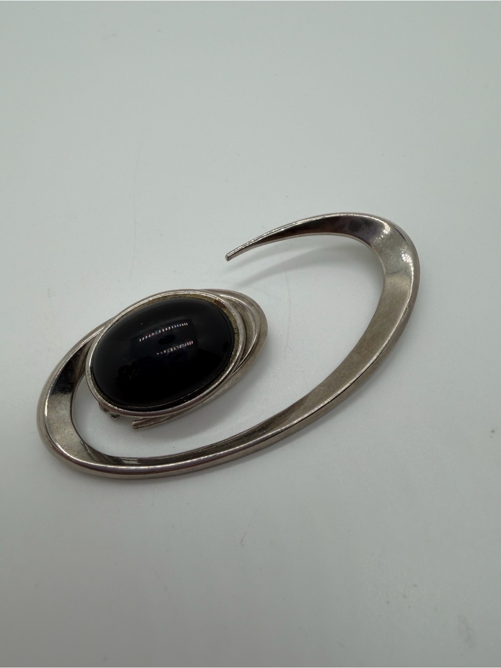 Vintage abstract silver tone black stone brooch